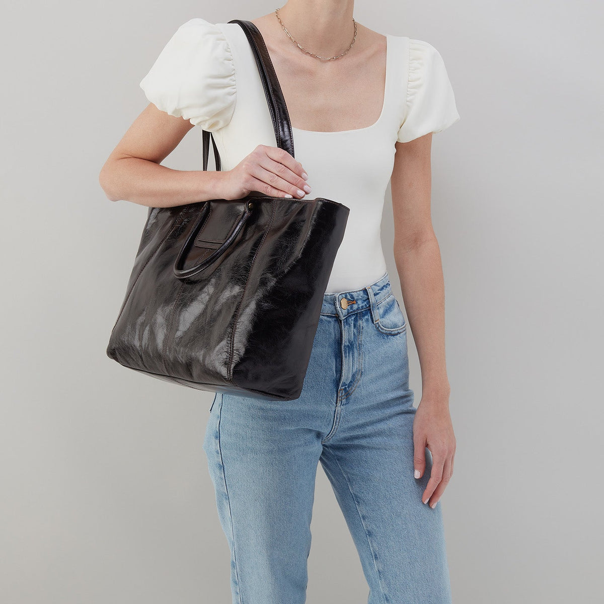 HOBO Sheila East-West Tote In Polished Leather - Black