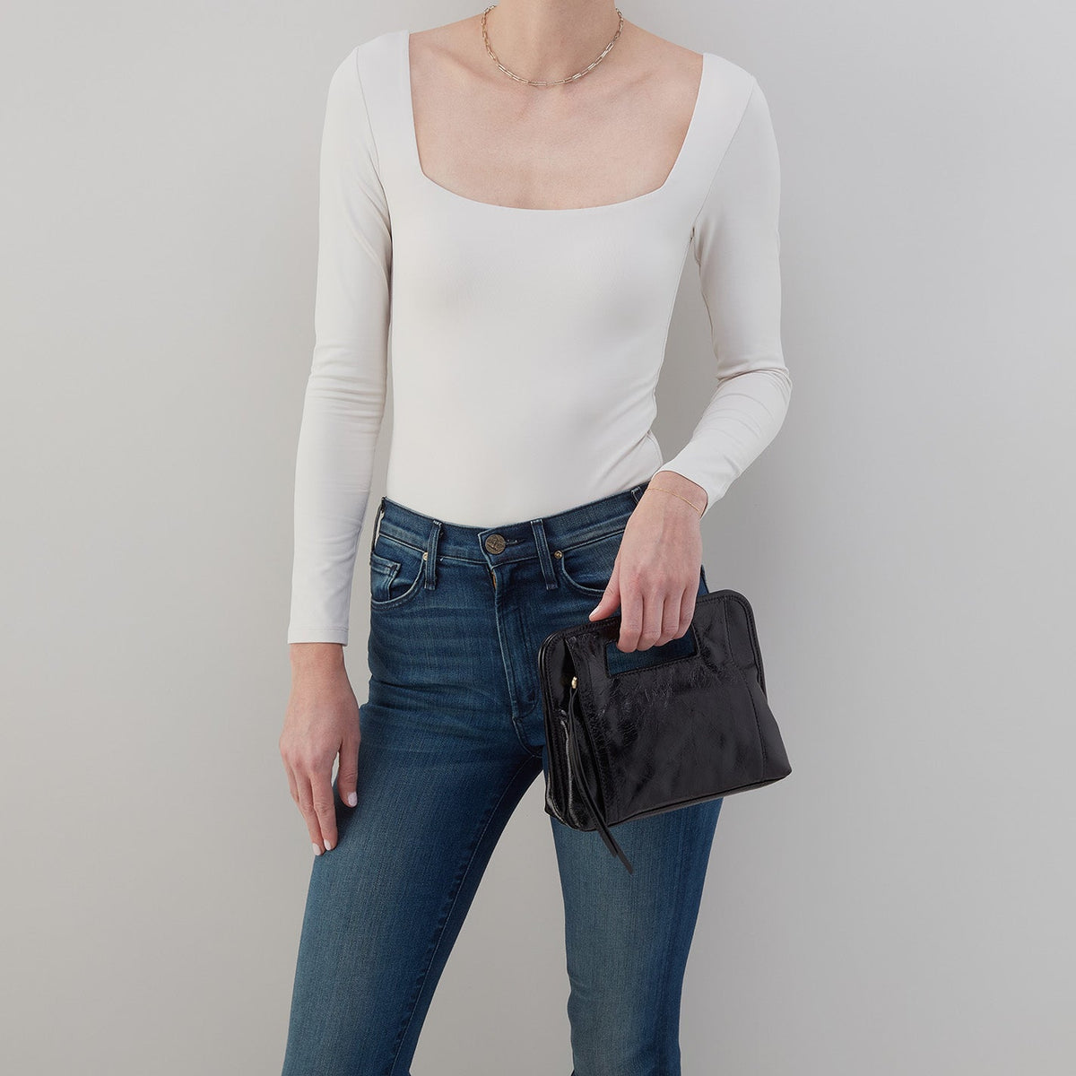 HOBO Ace Clutch In Polished Leather - Black