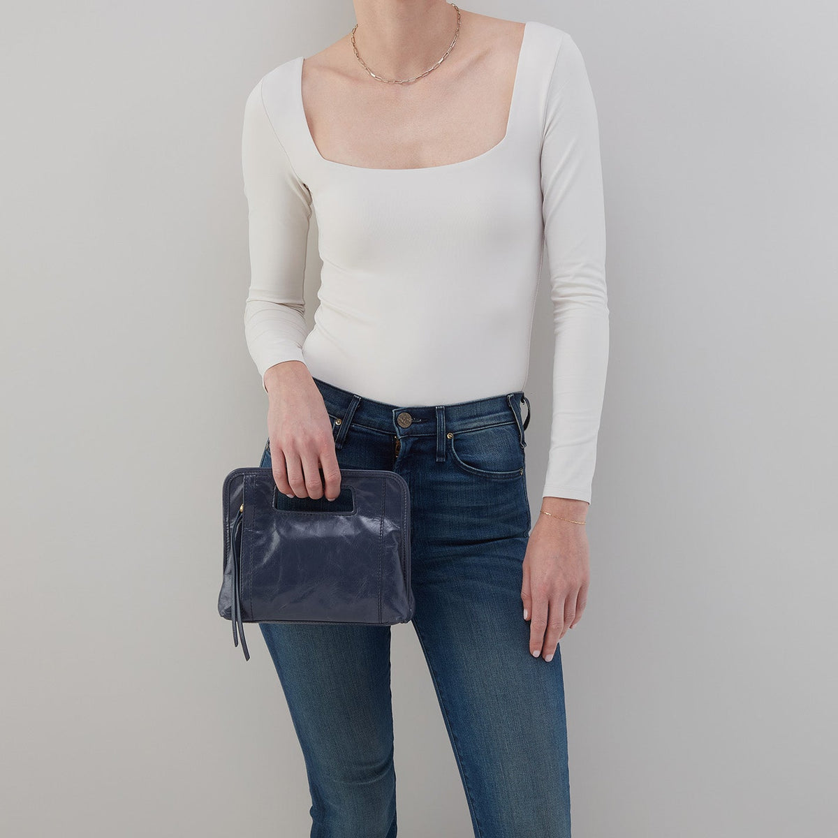HOBO Ace Clutch In Polished Leather - Blue Stone