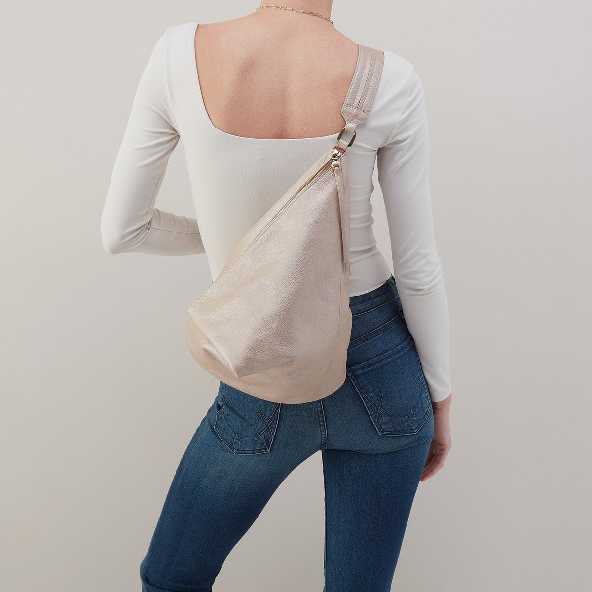 HOBO Sway Convertible Sling In Pebbled Metallic Leather - Grey Mist