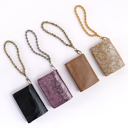 HOBO Ross Bead Wristlet In Polished Leather - Black