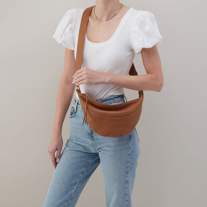 HOBO Carmen Sling In Pebbled Leather - Warm Honey