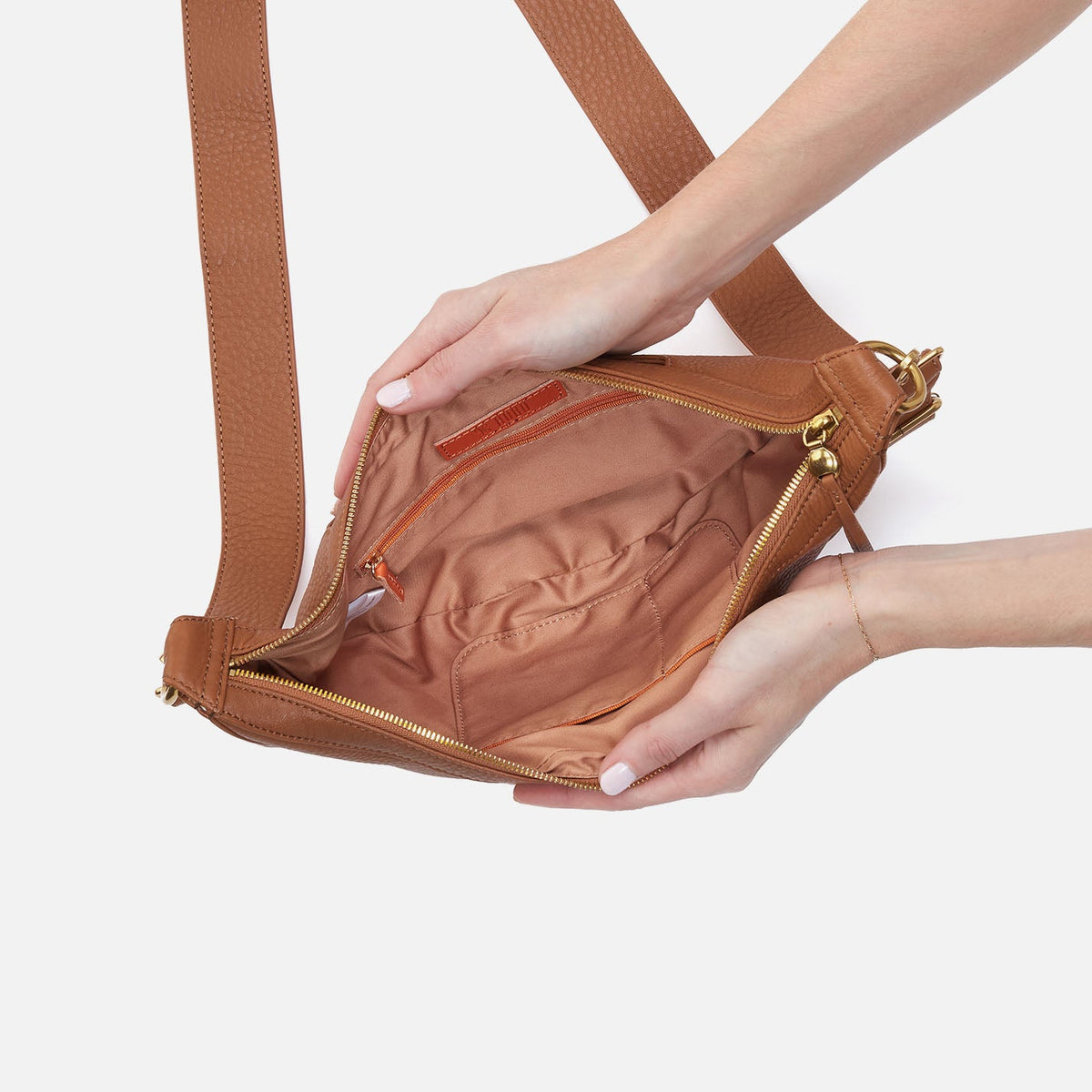 HOBO Carmen Sling In Pebbled Leather - Warm Honey