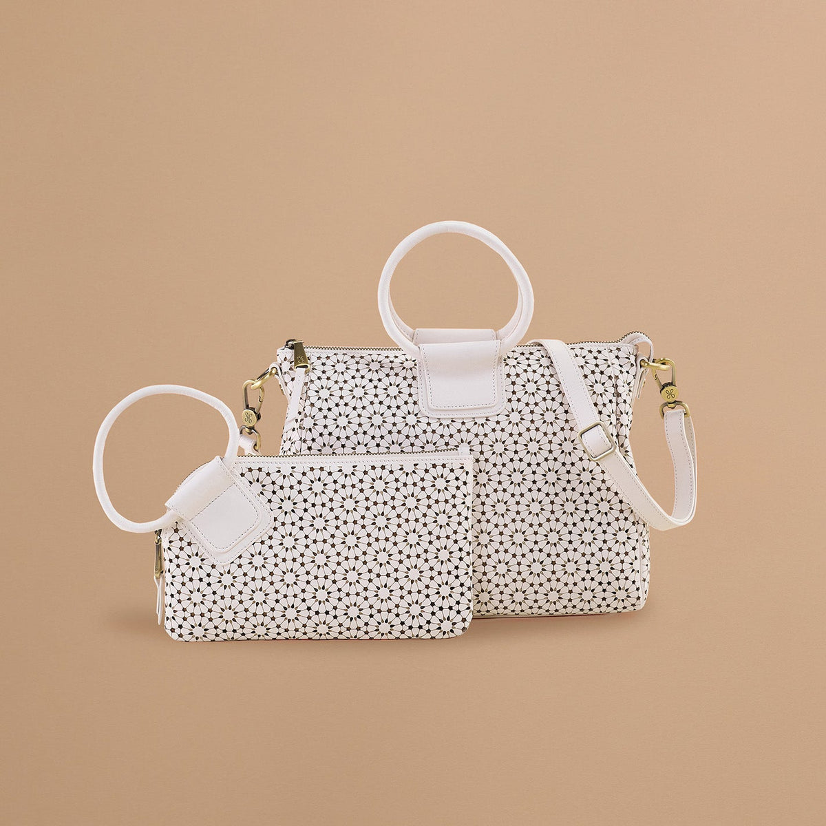 HOBO Sable Wristlet In Perforated Leather - Ecru Daisy Perf
