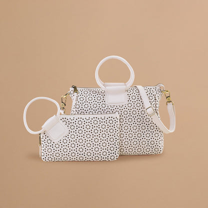 HOBO Sable Wristlet In Perforated Leather - Ecru Daisy Perf